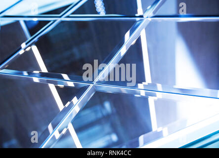 Glass, mirror reflection shapes and shadows. Close-up details.   Stock Photo
