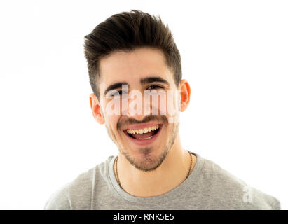 Close up portrait of happy young man having fun and joy smiling and laughing at the camera. In people, Human emotions, facial expressions, happiness a Stock Photo