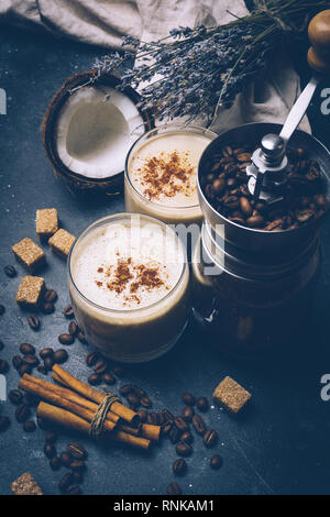 Coconut latte. Vegan coffee drink concept. Coffee with coconut milk. Health products Stock Photo