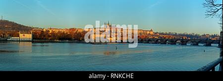 a clear winter day with view to Charles bridge in Prague early in the morning Stock Photo