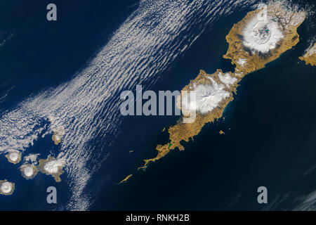 Umnak Island and its volcanic neighbors in the Aleutian Island chain. Part of the Fox Islands Stock Photo