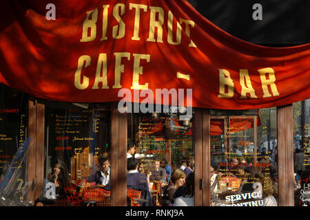 PARIS CAFE BISTROT BAR ON BOULEVARD - PARIS CAFE TERRASSE - A CROWDED TERRASSE CAFE IN PARIS - PARIS STREET -  COLOR ARCHIVE - PARIS STREET PHOTOGRAPHY © Frédéric BEAUMONT Stock Photo