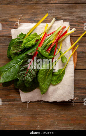 Rainbow swiss chard above on wood Stock Photo