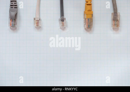 Network cables for connecting computers to the internet on a millimeter background Stock Photo