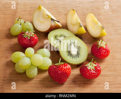 Fruit: Apple, green grapes, kiwi and strawberries. Stuido picture. Gremany. Stock Photo