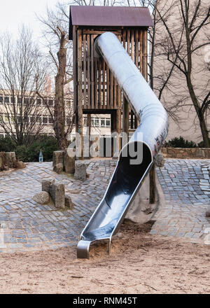 Berlin Mitte, Heinrich-Zille-Park, Long slide in Children’s adventure playground in Bergstraße, Stock Photo