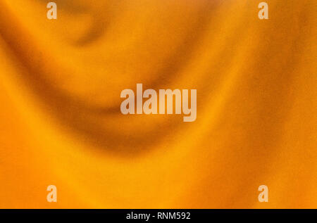 yellow fabric texture folds background Stock Photo