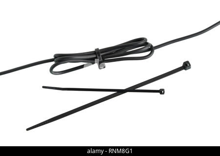 cable ties and wire tied with cable tie, isolated on white background Stock Photo