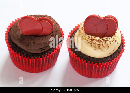 Two M&S chocolate heart cupcakes isolated on white background - for Valentines day Stock Photo