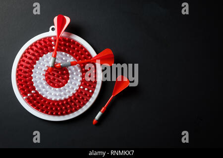 Dartboard with three dart arrows Stock Photo