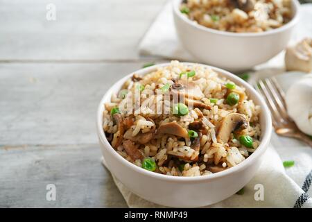 Homemade Mashroom Rice or Pilaf in a bowl close up, selective focus Stock Photo