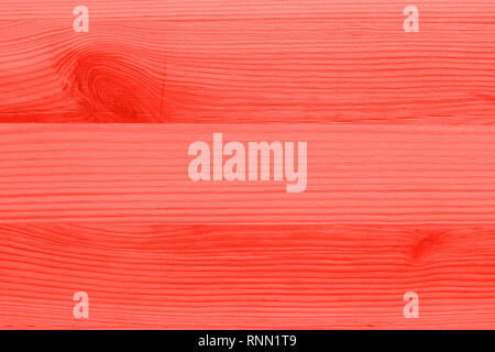 Pastel bright red rose colored wooden board, full frame, image background Stock Photo