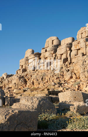 Headless seated statues in front of the stone pyramid 62 BC Royal Tomb of King Antiochus I Theos of Commagene, east Terrace, Mount Nemrut or Nemrud Da Stock Photo