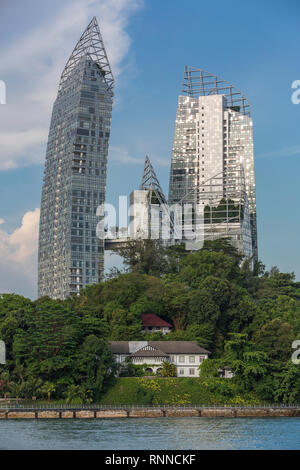 Singapore Juxtaposition of Old and New: Daniel Libeskind's 'Reflections' in Background vs. Harbourmaster's 1920-era House in foreground.  The apparent Stock Photo