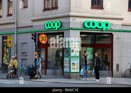 STOCKHOLM, SWEDEN - AUGUST 22, 2018: People visit Coop grocery store in Stockholm, Sweden. Monthly consumer spending in Sweden amounts to SEK 520 bill Stock Photo