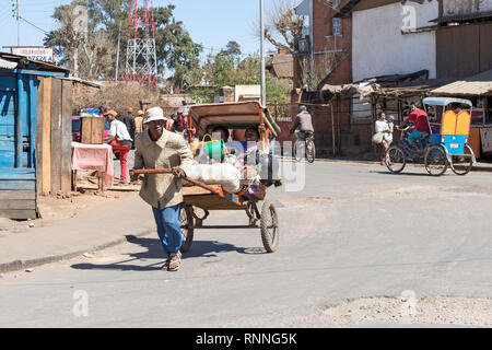 Views  along N7 road from Antsirtabe to Ranomafana National Park Madagascar -local rickshaws Stock Photo