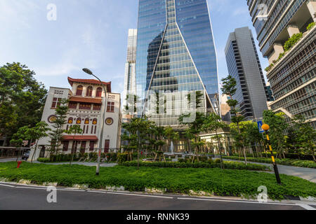 Singapore, Telok Ayer Chinese Methodist Church (1889).  Fraser's Tower Office Building in background. Stock Photo