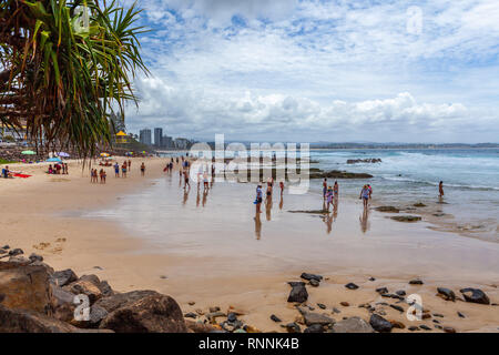 Coolangatta, Australia - January 6, 2019: People enjoying the summertime on Rainbow Bay beach. Coolangatta, NSW, Australia