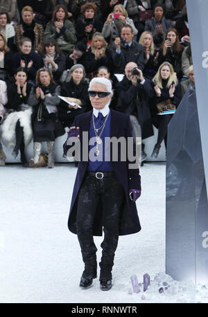Beijing, China. 6th Mar, 2012. File photo taken on March 6, 2012 shows Fashion designer Karl Lagerfeld waving at the end of Chanel's autumn-winter 2012/2013 women's ready-to-wear show in Paris, France. German Fashion designer Karl Lagerfeld died in Paris at the age of 85 on Tuesday. Credit: Gao Jing/Xinhua/Alamy Live News Stock Photo