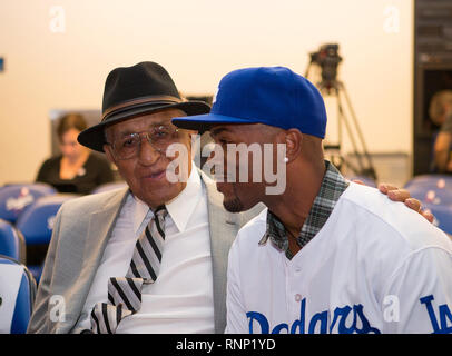 Los Angeles, CA, USA. 7th Jan, 2015. Jimmy Rollins has a chat with former Dodger NL MVP and Cy Young award winner Don Newcombe after his introductory press conference held at Dodger Stadium in Los Angeles, California. (Mandatory Credit: Juan Lainez/MarinMedia.org/Cal Sport Media) (Complete photographer, and credit required) Credit: csm/Alamy Live News Stock Photo