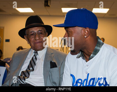 Los Angeles, CA, USA. 7th Jan, 2015. Jimmy Rollins has a chat with former Dodger NL MVP and Cy Young award winner Don Newcombe after his introductory press conference held at Dodger Stadium in Los Angeles, California. (Mandatory Credit: Juan Lainez/MarinMedia.org/Cal Sport Media) (Complete photographer, and credit required) Credit: csm/Alamy Live News Stock Photo