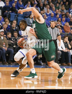 Buffalo guard Dontay Caruthers (22) looks to pass the ball past ...