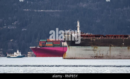 February 7, 2019 - Vancouver, British Columbia, Canada - Cargo ships anchored in the Port of Vancouver's outer harbor. (Credit Image: © Bayne Stanley/ZUMA Wire) Stock Photo