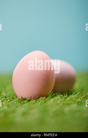 selective focus of easter painted eggs on grass Stock Photo