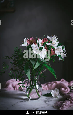 Jar of flower on table Stock Photo