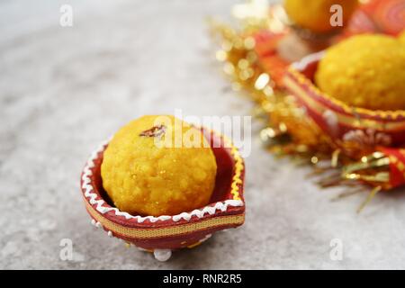 Homemade Laddu / Ladoo - Indian Diwali festival sweets close up, selective focus Stock Photo