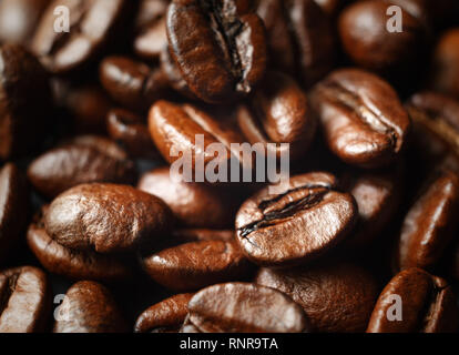 Roasted coffee beans close-up. Shallow depth of field. Selective focus. Stock Photo