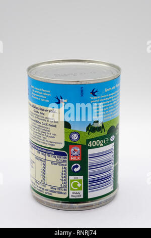 Largs, Scotland, UK - February 19, 2019: Ambrosia Branded Deven Custard in Recyclable Tin Can and label Nutritional and Recycling Information on Back. Stock Photo