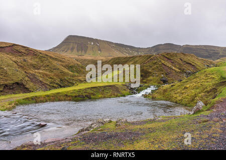 The Carmarthen Fans with the river Afon Sawdde and the peak of Fan Brycheiniog during winter in the Brecon Beacons National Park, South Wales, UK Stock Photo