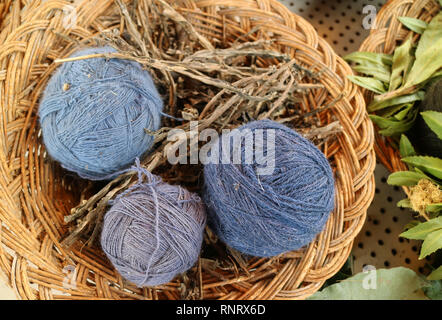 Basket of Blue Peruvian Alpaca Wool Yarn Balls Natural Dyed from Local Plants at Chinchero, the Andes Village in Cuzco Region of Peru Stock Photo