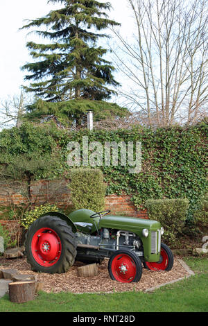 An old Ford tractor in the garden of the George and Dragon public house, Fordwich, Canterbury, Kent, UK. Stock Photo
