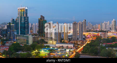 Cityscape of Panama City at night in panorama format with skyscrapers and a long night exposure, Panama, Central America.