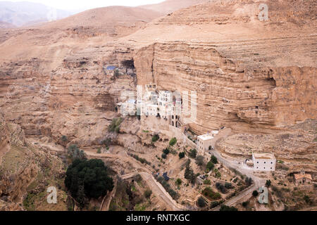 A view of St. George's Monastery (Monastery of Saints George and John Jacob of Choziba) in Wadi Qelt, Jericho, West Bank, Palestine Stock Photo