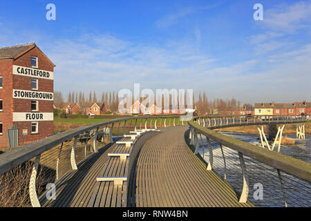 Millennium Bridge over the River Aire by Queen's Mill, Castleford, West Yorkshire, England, UK. Stock Photo