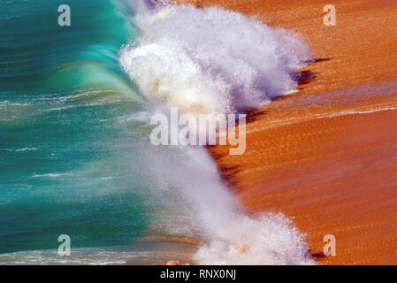 Soft blue ocean wave on sandy beach. Background. Stock Photo