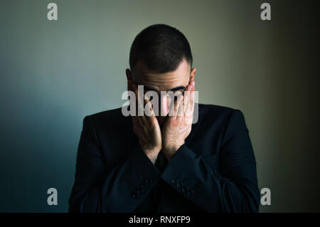 Man feeling tired upsed drepressed Stock Photo