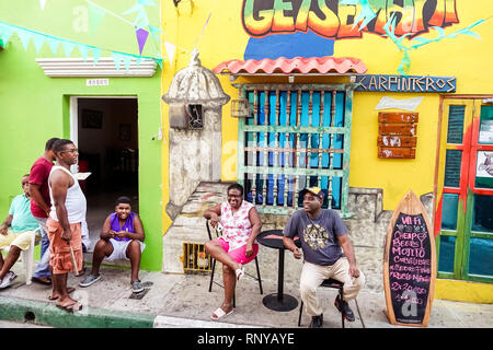 Cartagena Colombia,Center,centre,Getsemani,neighborhood,doorway,Karpinteros bar bars,wall mural,exterior,Black Blacks African Africans ethnic minority Stock Photo
