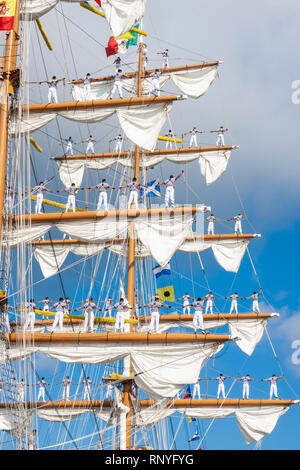 Crew climbing the rigging of Mexican navy training ship, Cuauhtemoc. Stock Photo