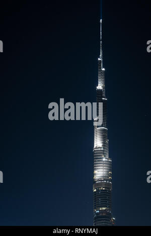 DUBAI, UAE - February 17, 2018: Deatil of Burj Khalifa top at night, tallest building in the world, Dubai, UAE Stock Photo