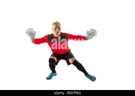 Goalkeeper ready to save on white studio background. Soccer football concept Stock Photo