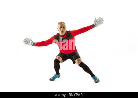 Goalkeeper ready to save on white studio background. Soccer football concept Stock Photo