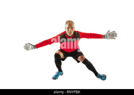 Goalkeeper ready to save on white studio background. Soccer football concept Stock Photo