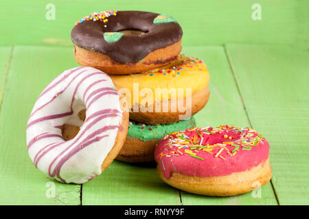 pile of glazed donuts isolated on white background. Stock Photo