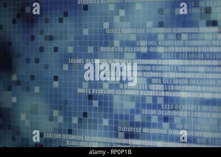 cold blue white binary winter. lines of binary codes moving from right to left on digital block shape pixels displayed on computer monitor. Stock Photo