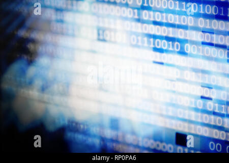 cold blue white binary winter. lines of binary codes moving from right to left on digital block shape pixels displayed on computer monitor. Stock Photo
