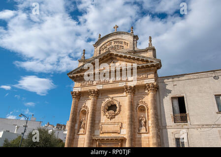 The picturesque old town and and Roman Catholic church Confraternity of Carmine. The white city in Apulia on the hill - Ostuni , Puglia, Italy Stock Photo